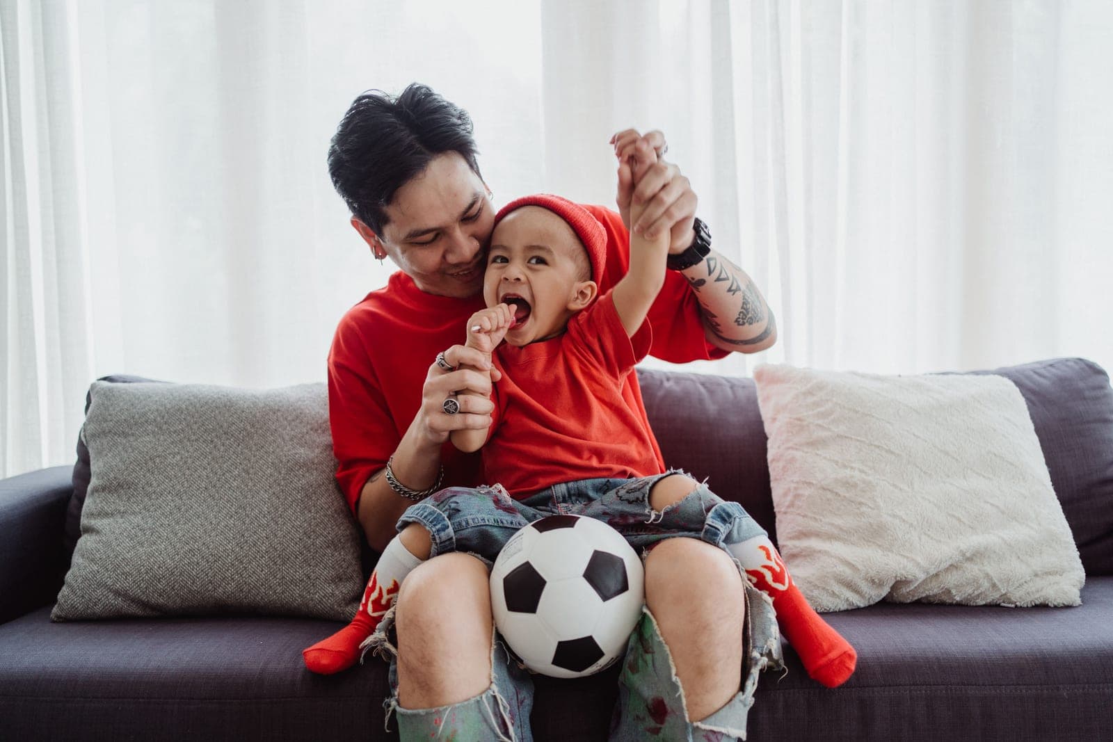A size 3 soccer ball with a young child