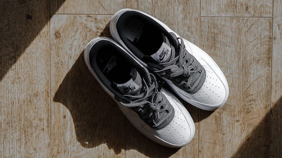 Sport shoes photographed from above on a plain surface