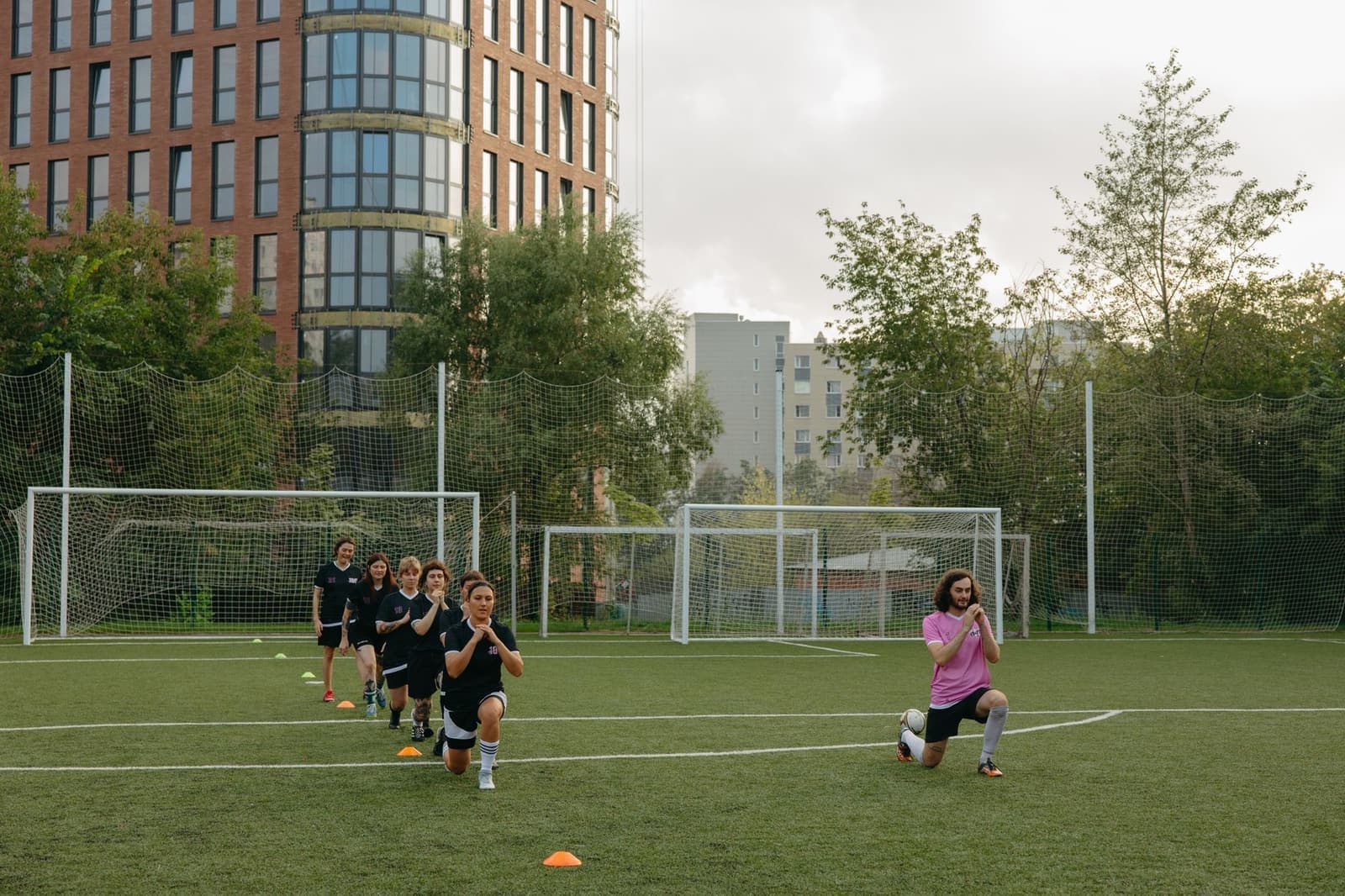 Soccer training equipment set out on grass
